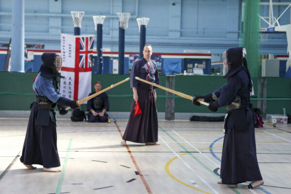 Pictured: Kendo Competition during the Martial Arts Inter Services Championship 2022 held at HMS Nelson, Portsmouth. 

MARTIAL ARTS INTER SERVICES CHAMPIONSHIP 2022

On 16th-17th July 2022, the Royal Navy Royal Marines Mixed Martial Arts Association hosted the Martial Arts Inter Services Championship 2022 at HMS Nelson, Portsmouth. It is the first Martial Arts Inter Services Championship since 2019, as COVID-19 discontinued 2020 and 2021 championships. 

Service members from a variety of martial arts disciplines, including Brazilian Jiu-Jitsu (BJJ), World Taekwondo Federation (WT), International Taekwondo Federation (ITF), and Kendo, competed in the Martial Arts Inter Services Championship 2022. The Army Karate team was unable to compete, so a different championship will be held for the Karate team later this year.

International Taekwondo Federation and Kendo competition was held on Saturday, 16th July 2022; World Taekwondo Federation and Brazilian Jiu-Jitsu competition was held on 17th July 2022.  

Kendo is a modern Japanese martial art, descended from kenjutsu, one of traditional Japanese martial arts, swordsmanship, that is bamboo swords as well as protective armour. Kendo competition consist of 3 Royal Navy and 3 Army competitors. AB Nolan, AB Howell and Major Bowlem won gold for team sparring and AB Nolan won gold for kata.