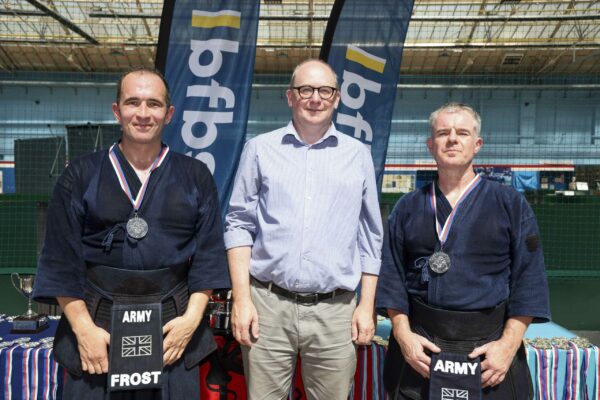Pictured: Major Frost and Major Raynolds from the British Army wins silver in the team kendo kata during the  Martial Arts Inter Services Championship 2022 held at HMS Nelson, Portsmouth. 

MARTIAL ARTS INTER SERVICES CHAMPIONSHIP 2022

On 16th-17th July 2022, the Royal Navy Royal Marines Mixed Martial Arts Association hosted the Martial Arts Inter Services Championship 2022 at HMS Nelson, Portsmouth. It is the first Martial Arts Inter Services Championship since 2019, as COVID-19 discontinued 2020 and 2021 championships. 

Service members from a variety of martial arts disciplines, including Brazilian Jiu-Jitsu (BJJ), World Taekwondo Federation (WT), International Taekwondo Federation (ITF), and Kendo, competed in the Martial Arts Inter Services Championship 2022. The Army Karate team was unable to compete, so a different championship will be held for the Karate team later this year.

International Taekwondo Federation and Kendo competition was held on Saturday, 16th July 2022; World Taekwondo Federation and Brazilian Jiu-Jitsu competition was held on 17th July 2022.  

Kendo is a modern Japanese martial art, descended from kenjutsu, one of traditional Japanese martial arts, swordsmanship, that is bamboo swords as well as protective armour. Kendo competition consist of 3 Royal Navy and 3 Army competitors. AB Nolan, AB Howell and Major Bowlem won gold for team sparring and AB Nolan won gold for kata.