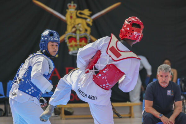 Pictured: World Taekwondo Competition during the Martial Arts Inter Services Championship 2022 held at HMS Nelson, Portsmouth. 

MARTIAL ARTS INTER SERVICES CHAMPIONSHIP 2022

On 16th-17th July 2022, the Royal Navy Royal Marines Mixed Martial Arts Association hosted the Martial Arts Inter Services Championship 2022 at HMS Nelson, Portsmouth. It is the first Martial Arts Inter Services Championship since 2019, as COVID-19 discontinued 2020 and 2021 championships. 

Service members from a variety of martial arts disciplines, including Brazilian Jiu-Jitsu (BJJ), World Taekwondo Federation (WT), International Taekwondo Federation (ITF), and Kendo, competed in the Martial Arts Inter Services Championship 2022. The Army Karate team was unable to compete, so a different championship will be held for the Karate team later this year.

International Taekwondo Federation and Kendo competition was held on Saturday, 16th July 2022; World Taekwondo Federation and Brazilian Jiu-Jitsu competition was held on 17th July 2022.  

ITF and WT are quite similar and both have their roots in Korean martial arts, although WT is more of a sport, and ITF is more of a traditional self-defense. Four of the 13 competitors in this year's WTF, WO Hewett, LET La Roche, AB Lee, and Cpl Bevan, represented the Royal Navy. Receptively, LET La Roche and AB Lee took home a silver and a gold. There were 14 competitors for the ITF, including WO Hewett, Cpl Bevan, AWW Shepherd, and CS Pedley from the Royal Navy. For the Royal Navy, AWW Shepherd from HMS Raleigh and CS Pedley from HMS Defender each got a gold medal.